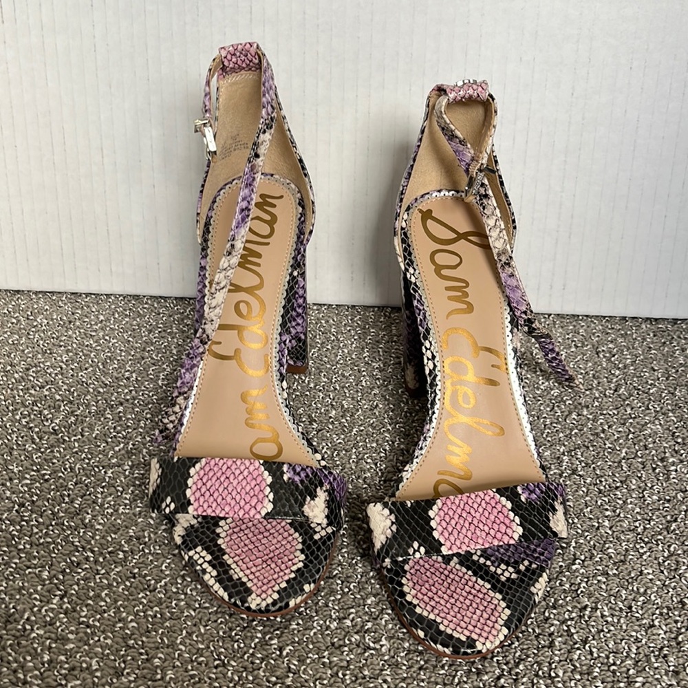 Women’s snakeskin-look high heels .